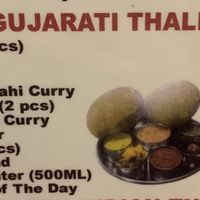 Gujarati Thali (desert is not vegan, server said everything else was but I don’t know if I believe him). at Khana Khazana in Bangkok