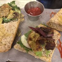They cut the burger in half width wise and broke it up. None of us even the people with the burger bun got a full burger   at Verde in Granada
