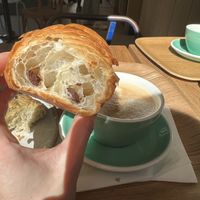 Chocolate croissant and oat late - super good😄 at Land & Monkeys - Pernety in Paris