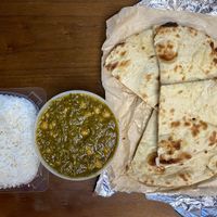 Palak Chana with rice and Roti takeout
Naan is apparently not vegan. Opt for the Roti instead. at Pal Indian Cuisine in Topeka