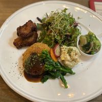 Potato croquette with Karaage, salad, and pickled veggies   at Rainbow Bird Rendezvous in Tokyo