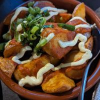 Patatas bravas, herb aioli, salsa $14.00 at Repeat Offender in Elwood