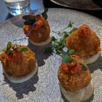 Cauliflower potato croquettes, romesco, mayo $16.00 at Repeat Offender in Elwood
