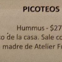 Hummus con pan de masa madre at Cerveceria Charlone in Buenos Aires