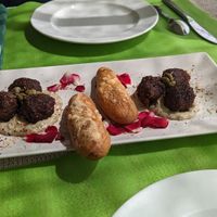 Vegan German meatballs with pretzels. The meatballs are the best! at El Invernadero in Fuerteventura