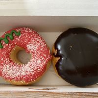 Red strawberry and boston creme. at Dunkin' in Goes