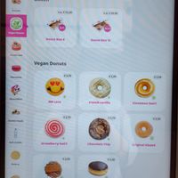Separate vegan section on interactive menu/ordering station (selection varies based on day/time) at Dunkin' in Leiden