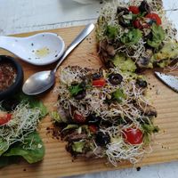 Garlic mushroom avocado toast on pumpernickel at Elixir Spot in Puerto Vallarta