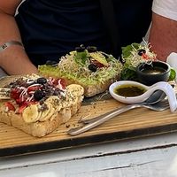Fruit toast and avocado toast. Both were delicious!  at Elixir Spot in Puerto Vallarta