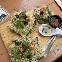 Garlic Mushroom toast and Hummus Avocado toast on pumpernickel  at Elixir Spot in Puerto Vallarta