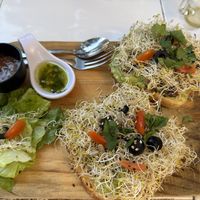 Avocado hummus toast + garlic mushroom toast  at Elixir Spot in Puerto Vallarta