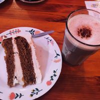 Vegan carrot cake & home brewed chai latte! Tasted really good! ❤️ at Cafe Babalu in Reykjavik