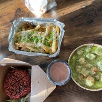 Vegan loaded fries, vegan burger and vegan gnocchi  at De Vegakoerier in Castricum