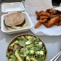 Not so beef burger, sweet potato wedges, pasta salad  at De Vegakoerier in Castricum