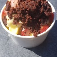 Pineapple Dole Whip with fresh strawberries and brownie bites (all vegan) at Cinnaholic in Arlington