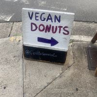 Sign on corner to guide you to donuts  at Little Vessels Donut Co in Honolulu