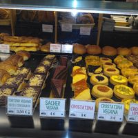 Cakes and brioches, green label means 'vegan' at Forno Brisa - Via Galliera in Bologna