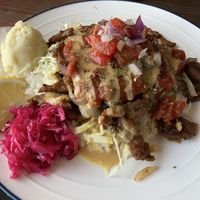 Cheesy chicken over rice at Rotton 六屯 in Chatan