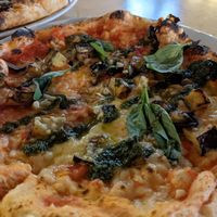 Vegan pizza with pesto and aubergine at Kommune - Food Court in Sheffield