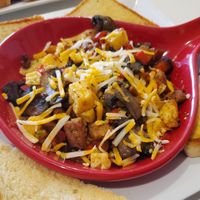 vegan skillet - Just Egg, Beyond sausage, twisted taters, roasted red peppers, mushrooms, Vio-Life "cheese", Texas toast at Twisted Citrus in North Canton