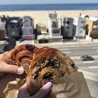 Cinnamon roll and olive jalapeño croissant  at Chaumont Vegan in Beverly Hills