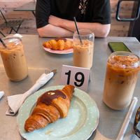Chocolate orange croissant and oat milk iced coffee  at Chaumont Vegan in Beverly Hills
