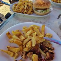 Vegan burger & vegan children's sausage meal at Gigi's Chippy Diner in Menorca