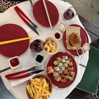 KFC burger, “prawn” tempura in a bowl, sushi plate, chips  at 123V Browns in London