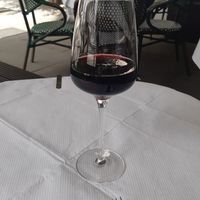 Glass of pricey wine at 123V Browns in London