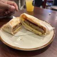 Fuego Breakfast Sandwich on a wrap  at Apothica Cafe in Cumberland