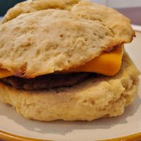 sausage egg and cheese on a biscuit at Apothica Cafe in Cumberland