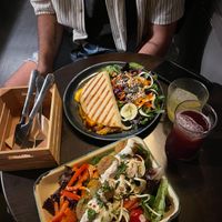 Quesadilla de hummus, queso vegano y boniato y plato del día (falafel)  at La Bohême in Cordoba