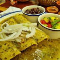 Enchiladas with green sauce  at La Cueva del Chango in Playa Del Carmen