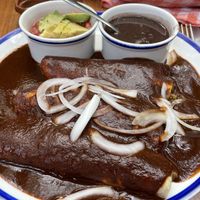 Enchiladas with mole sauce  at La Cueva del Chango in Playa Del Carmen