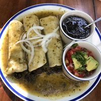 Mushroom enchiladas with green sauce   at La Cueva del Chango in Playa Del Carmen