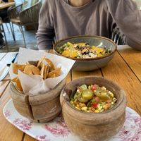 Guacamole con nachos ☀️  at Oassis Natural Cooking in Barcelona