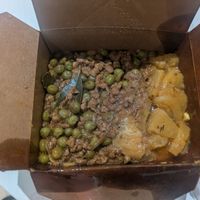 Too good to go meal (lentil curry, pineapple, rice, peas) at PlantXology in East London