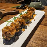 Mushroom, aubergine stacks with peanut sauce at Sangha Vegetarian Restaurant in Da Nang