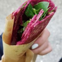Beetroot galette with spinach, avocado and walnuts at Coucou Food Market in Munich