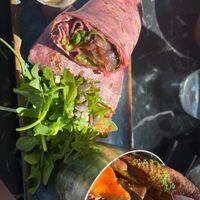 Veggie wrap with vegan, halloumi cheese and sweet potato fries with vegan mayo. Delicious at Fitology Kitchen in Chislehurst