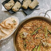 Vegan paella, spinach croquettes, and ensaladilla at PÖTSTOT in Barcelona