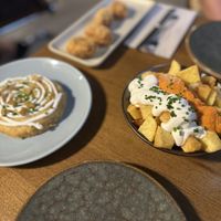 Potato omelette, beetroot “cheese” croquettes and potatoes bravas  at PÖTSTOT in Barcelona