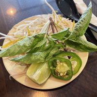 Here’s the tiny plate of add-ons that costs an extra $2.75 for vegans. The omnivores get this free. Unfair!!   at Pho Company Noodle House in Deland