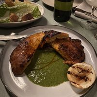 Peri peri vegan chicken and Caesar salad in the back   at Lona Misa in South Yarra