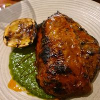 FIRE ROASTED CHICKEN, BASTED IN A FERMENTED PERI PERI
SAUCE.SERVED WITH CHIMICHURRI
 at Lona Misa in South Yarra