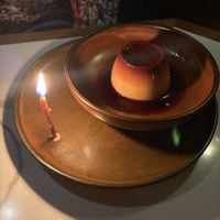 Flan Mexicano (burnt caramel and citrus) with a complimentary birthday candle    at Lona Misa in South Yarra