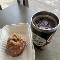 Ube latte and huge raised donut   at Zendo - Coffee Shop in Albuquerque
