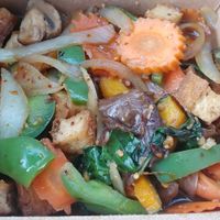 P.E.T (a la carte which comes with bigger portion and side of rice) Spicy sauce, but flavorful. Vegetables were well cooked. Tofu had a nice consistency. $9.95 at Thai Vegan - temporarily closed in Albuquerque