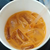Thai Iced Tea. Strong but well balanced cream to tea ratio. $2.99 at Thai Vegan - temporarily closed in Albuquerque