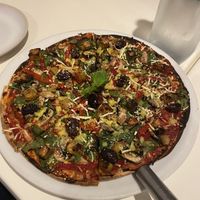 Pizza with Kumara and olives   at UMU in Coromandel